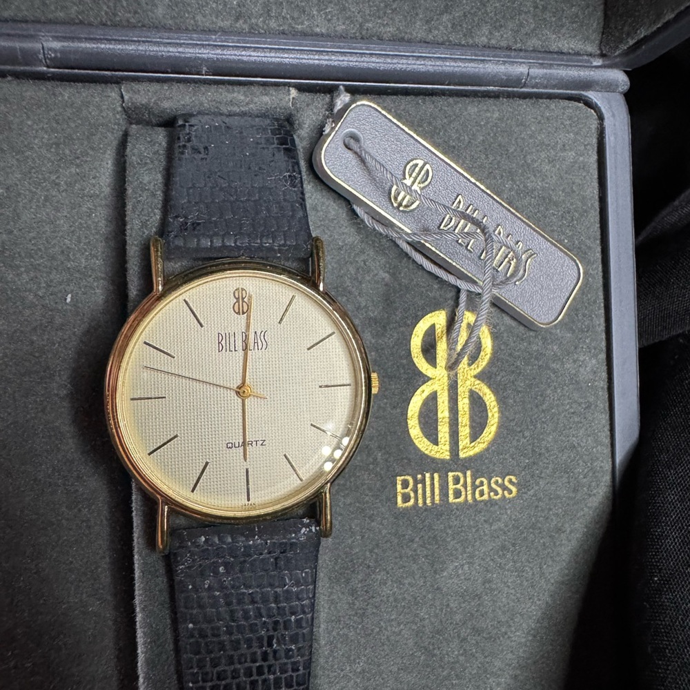 Bill Blass Gold Case Watch with Black Strap